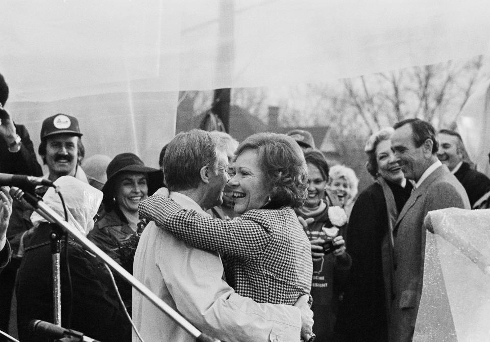 FILE - Former President Jimmy Carter twirls his wife, first lady Rosalynn Carter, to the music of a country band at a rally in their honor, Jan. 20, 1981, in Plains. Ga. Rosalynn Carter, the closest adviser to Jimmy Carter during his one term as U.S. president and their four decades thereafter as global humanitarians, died Sunday, Nov. 19, 2023. She was 96. (AP Photo/Joe Holloway, Jr., File)