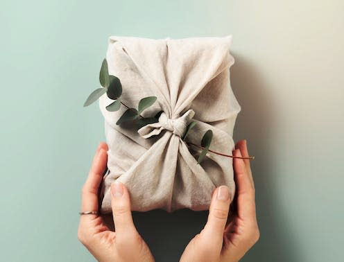 <span class="caption">Yule be glad you did. </span> <span class="attribution"><a class="link " href="https://www.shutterstock.com/image-photo/furoshiki-tissue-wrapping-presents-female-hand-2358189195" rel="nofollow noopener" target="_blank" data-ylk="slk:Eriheorghiu;elm:context_link;itc:0;sec:content-canvas">Eriheorghiu</a></span>