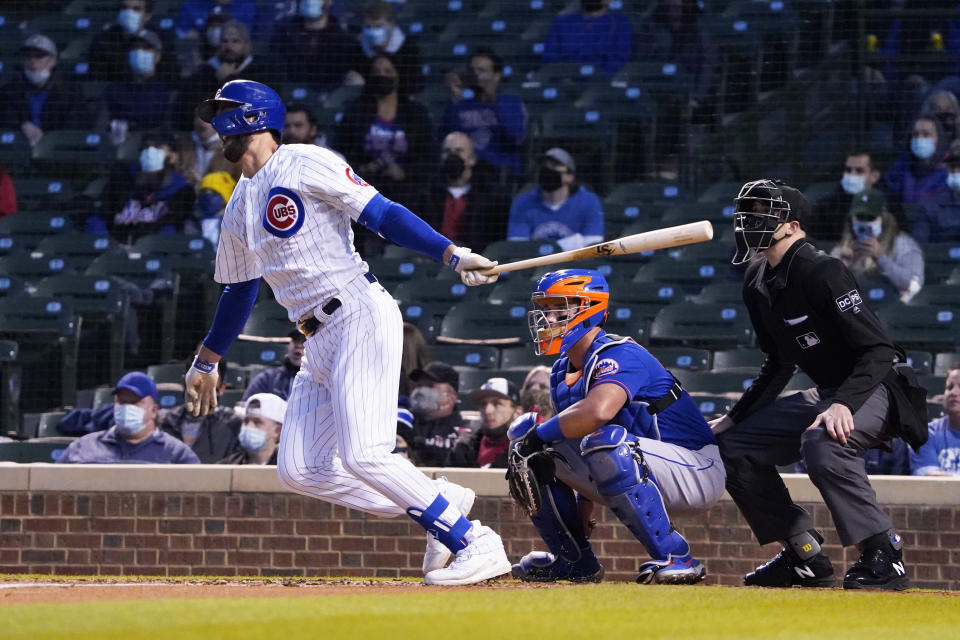 Chicago Cubs' Kris Bryant (17) hits a two-run double against the New York Mets during the third inning of a baseball game, Thursday, April, 22, 2021, in Chicago. (AP Photo/David Banks)