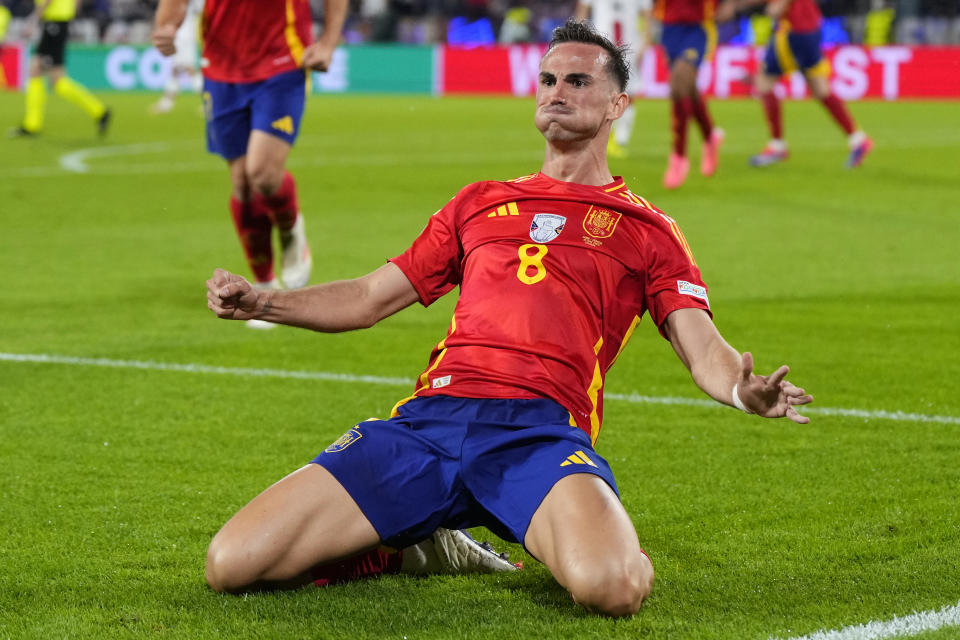 Spain's Fabian Ruiz celebrates after scoring his sides second goal during a round of sixteen match between Spain and Georgia at the Euro 2024 soccer tournament in Cologne, Germany, Sunday, June 30, 2024. (AP Photo/Manu Fernandez)