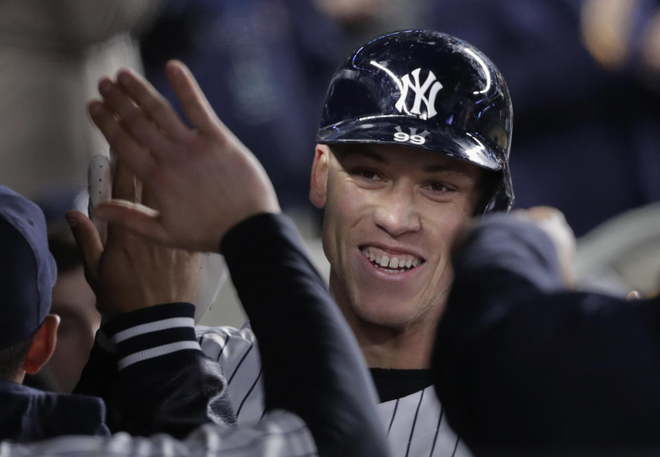 New York Yankees right fielder Aaron Judge played catch with a fan between innings Monday night. (AP Photo)