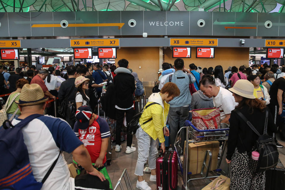 Passengers are seen at KLIA2 in Sepang August 22, 2019, during a systems outage. — Picture by Yusof Mat Isa