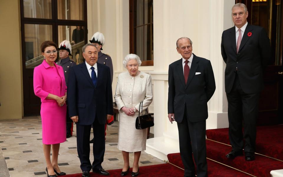 Dariga and Nursultan Nazarbayev meeting members of the Royal Family in 2015 - Chris Jackson/AFP