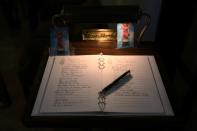 <p>The guestbook of Eric Ivan Ortiz-Rivera, one of the victims of the shooting at the Pulse night club in Orlando, is pictured at his wake in Kissimmee, Florida, on June 16, 2016. (Photo: Carlo Allegri/Reuters) </p>