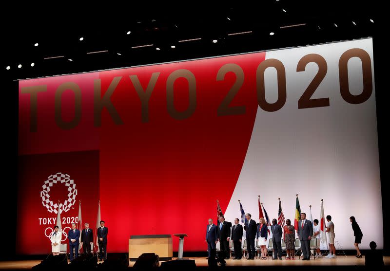 FILE PHOTO: Officials attend the 'One Year to Go' ceremony celebrating one year out from the start of the summer games in Tokyo