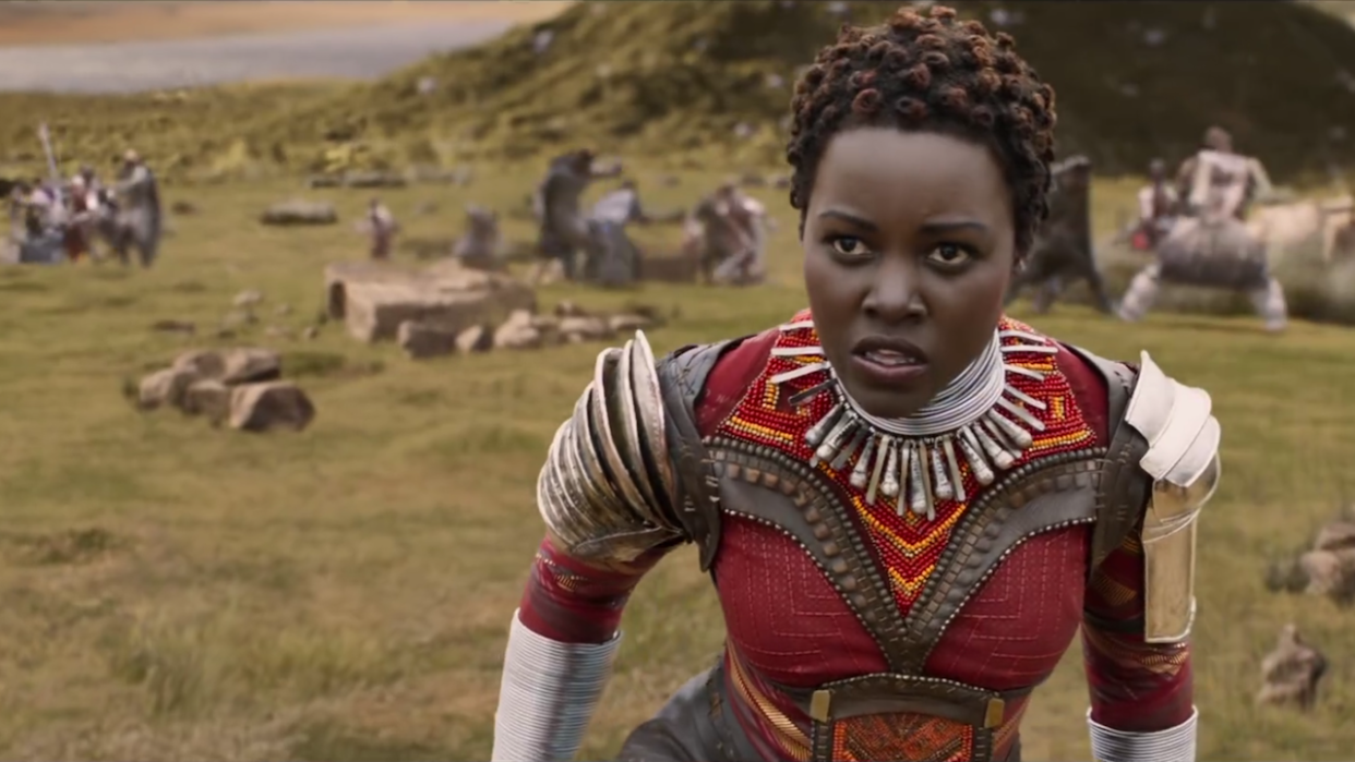  Lupita Nyong'o as Nakia in Dora Milaje outfit in Wakanda in Black Panther 