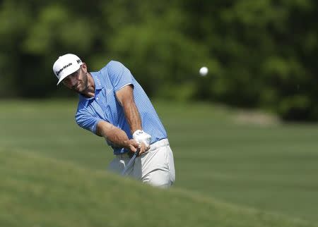 Mar 26, 2017; Austin, TX, USA; Dustin Johnson of the United States plays against Jon Rahm of Spain during the final round of the World Golf Classic - Dell Match Play golf tournament at Austin Country Club. Mandatory Credit: Erich Schlegel-USA TODAY Sports