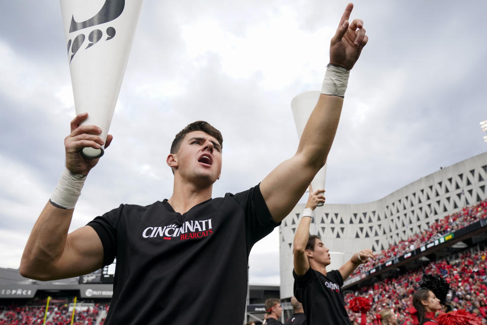 Cincinnati cheerleaders perform during the second half of an NCAA college football game against Baylor, Saturday, Oct. 21, 2023, in Cincinnati. (AP Photo/Jeff Dean)