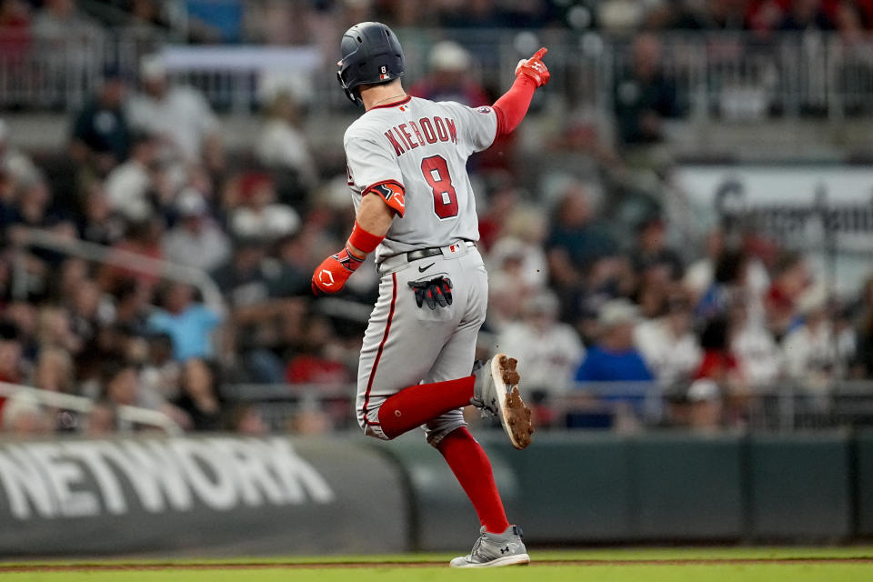 Washington Nationals' Carter Kieboom (8) celebrates his three-run homer against the Atlanta Braves during fourth inning of an baseball game, Friday, Sept. 29, 2023, in Atlanta. (AP Photo/Mike Stewart)