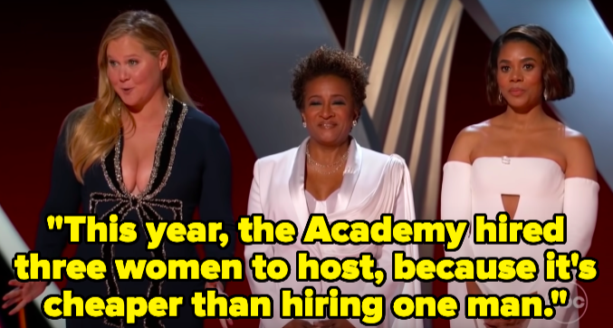 The three hosts with the words, "This year, the Academy hired three women to host, because it's cheaper than hiring one man"