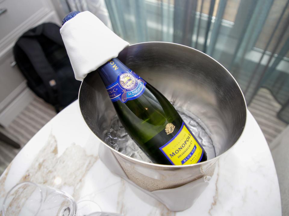 A bottle in an ice bucket on the Oceania Vista veranda stateroom