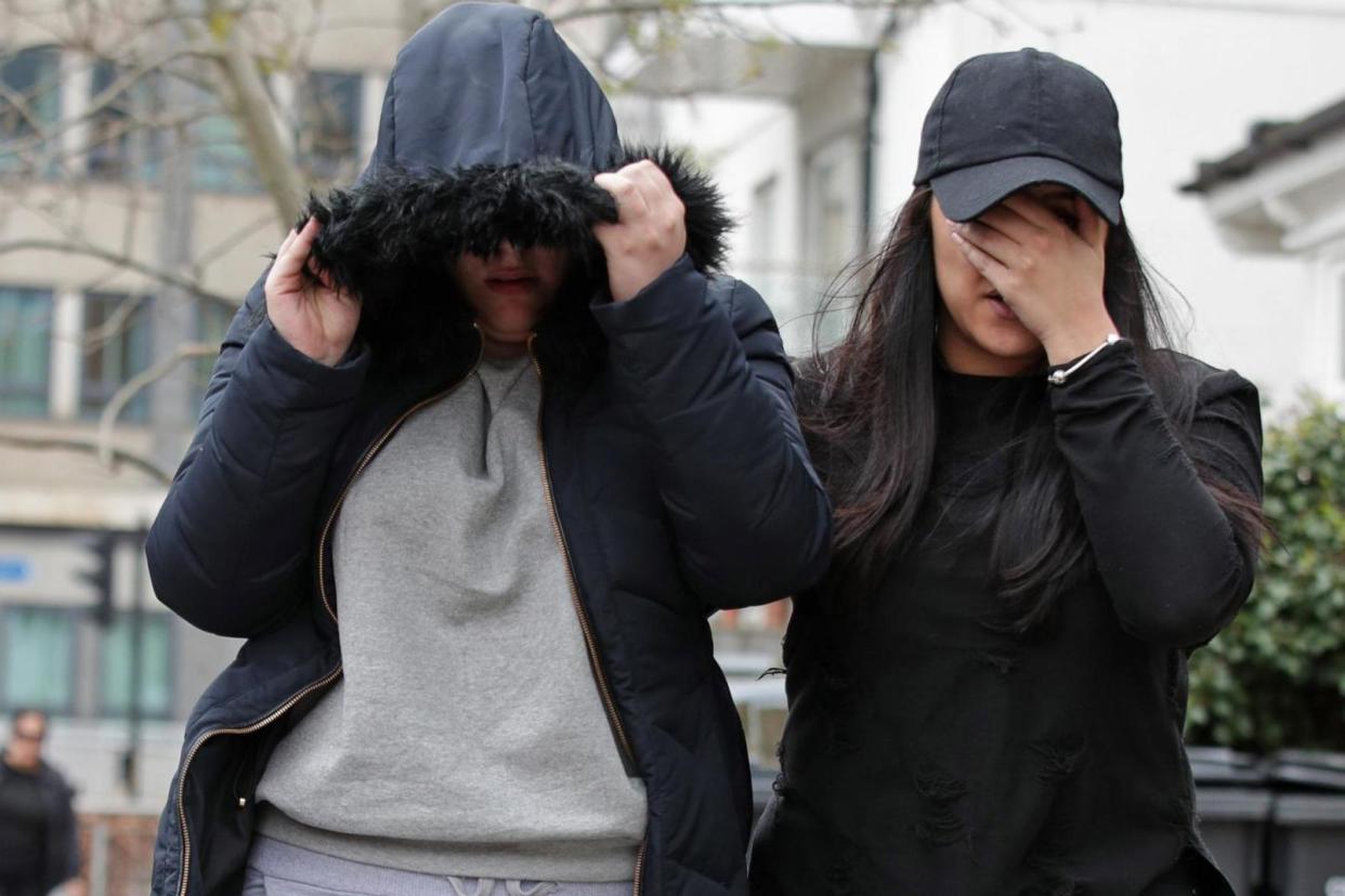 Ellie Leite, 19, (left) leaves Croydon Magistrates' Court where she is among a group charged with violent disorder: PA