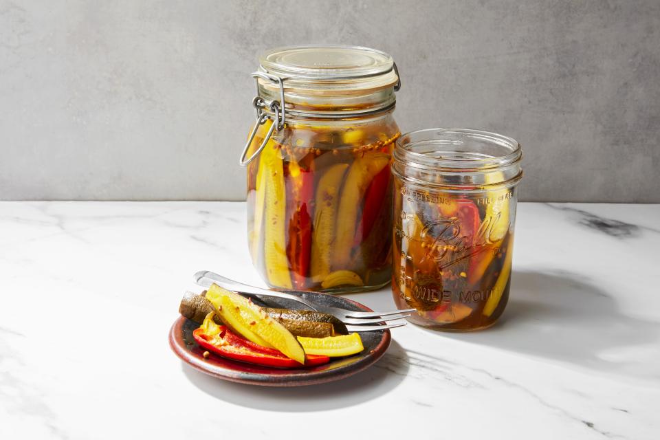 One of the best ways to use your farmers market surplus is to make your own pickles. This recipe swaps cucumbers for zucchini for a unique take on <a href="https://www.epicurious.com/recipes/food/views/fast-favorite-garlic-dill-pickles-230707?mbid=synd_yahoo_rss" rel="nofollow noopener" target="_blank" data-ylk="slk:dill pickles;elm:context_link;itc:0" class="link ">dill pickles</a>. <a href="https://www.epicurious.com/recipes/food/views/zucchini-dill-pickles-366756?mbid=synd_yahoo_rss" rel="nofollow noopener" target="_blank" data-ylk="slk:See recipe.;elm:context_link;itc:0" class="link ">See recipe.</a>