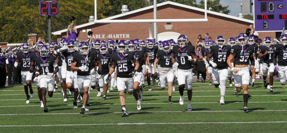 The Mount Union Purple Raiders take the field before their game against Ohio Northern in September.