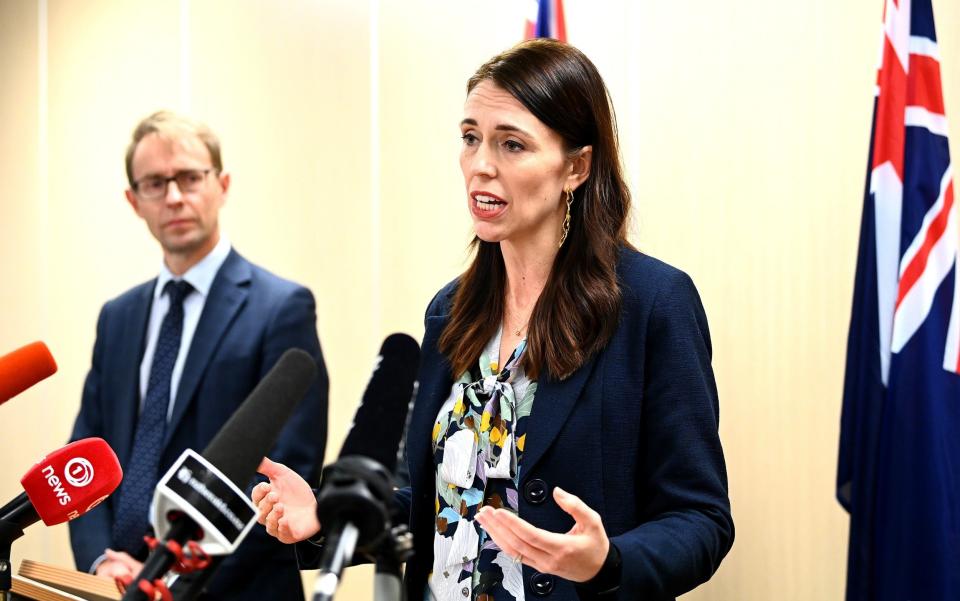 New Zealand Prime Minister Jacinda Arden announces that the quarantine-free travel arrangement with Australia will end tonight for at least eight weeks, due to rising Covid-19 cases in Australia, in Auckland, New Zealand on 23 July 2021 - Hannah Peters/Getty Images