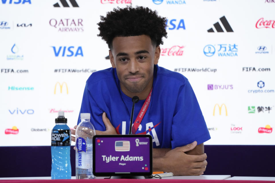 Tyler Adams of the United States attends a press conference on the eve of the group B World Cup soccer match between England and the United States, in Doha, Qatar, Thursday, Nov. 24, 2022. (AP Photo/Ashley Landis)