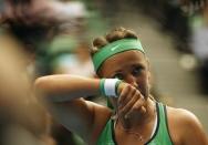 Belarus' Victoria Azarenka reacts during her quarter-final match against Germany's Angelique Kerber at the Australian Open tennis tournament at Melbourne Park, Australia, January 27, 2016. REUTERS/Tyrone Siu