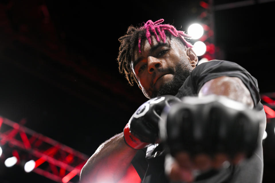 Sep 2, 2023; Paris, France; Morgan Charriere (red gloves) celebrates defeating Manolo Zecchini (blue gloves) during UFC Fight Night at Accor Arena. Mandatory Credit: Per Haljestam-USA TODAY Sports