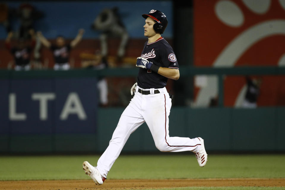 Washington Nationals' Trea Turner doubles in the seventh inning of a baseball game against the Colorado Rockies, Tuesday, July 23, 2019, in Washington. With his double, Turner hit for the cycle in the game. Washington won 11-1. (AP Photo/Patrick Semansky)