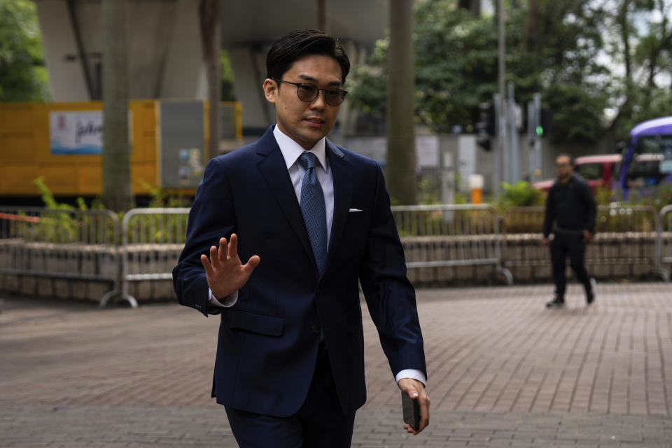 Pro-democracy activist Michael Pang arrives at the West Kowloon courts as closing arguments open in Hong Kong's largest national security trial of 47 pro-democracy figures in Hong Kong, Wednesday, Nov. 29, 2023. (AP Photo/Louise Delmotte)