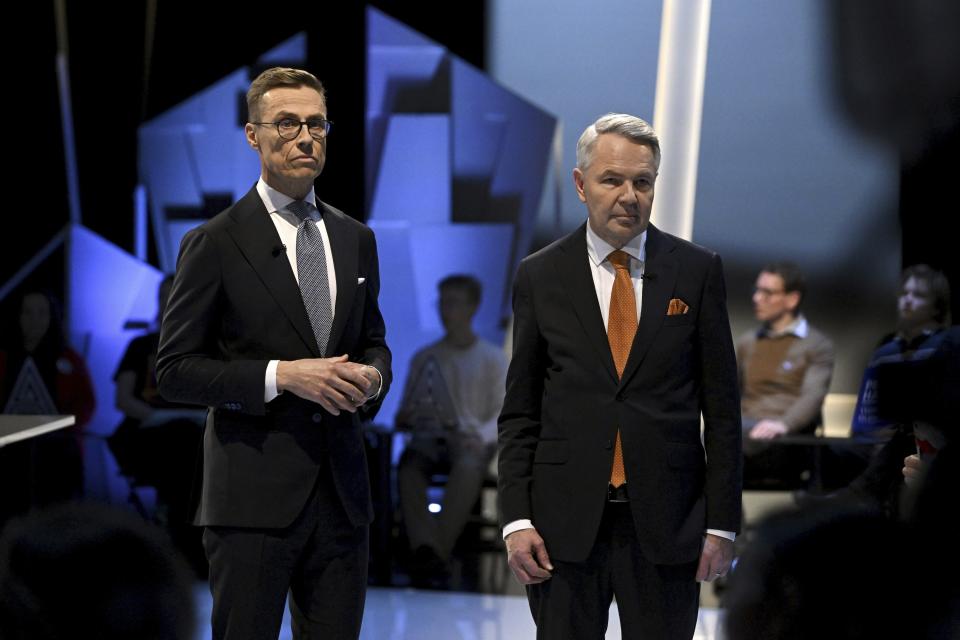 National Coalition Party (NCP) presidential candidate Alexander Stubb, left, and social movement presidential candidate Pekka Haavisto, (The Greens) stand at the Finnish national broadcast company Yle's presidential debate for the second round of Finland's presidential elections in Helsinki, Thursday, Feb. 1, 2024. Finns on Sunday, Feb. 11, 2024 will pick a new head of state from the array of two experienced politicians whose main will be to steer the Nordic country’s foreign and security policy at an unprecedented time when the country is now a NATO member following Russia’s invasion of Ukraine, and its eastern border with Russia remains closed. (Antti Aimo-Koivisto/Lehtikuva via AP, File)