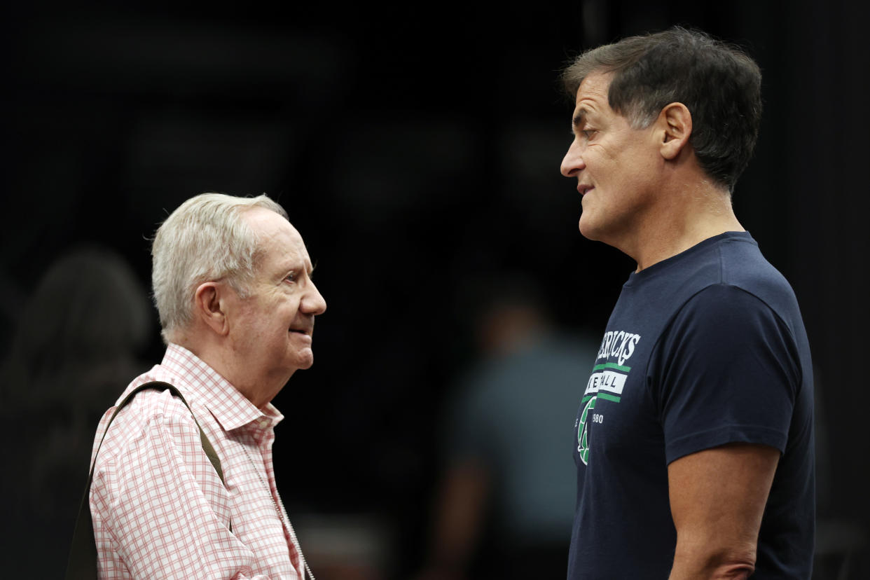 PHOENIX, ARIZONA - MAY 15: Phoenix Suns broadcaster Al McCoy talks with Dallas Mavericks owner Mark Cuban after Game Seven of the 2022 NBA Playoffs Western Conference Semifinals between the Dallas Mavericks and the Phoenix Suns at Footprint Center on May 15, 2022 in Phoenix, Arizona. NOTE TO USER: User expressly acknowledges and agrees that, by downloading and/or using this photograph, User is consenting to the terms and conditions of the Getty Images License Agreement. (Photo by Christian Petersen/Getty Images)