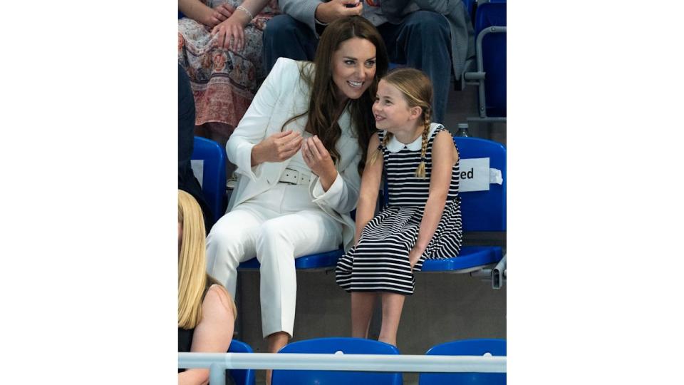 Kate Middleton with Princess Charlotte of Cambridge at the swimming during the 2022 Commonwealth Games on August 2, 2022 in Birmingham, England