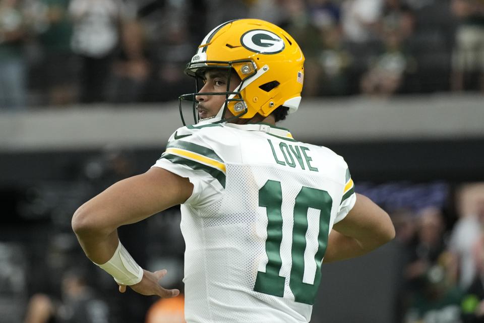 Green Bay Packers' Jordan Love warms up before an NFL football game against the Las Vegas Raiders Monday, Oct. 9, 2023, in Las Vegas. (AP Photo/John Locher)