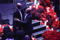 Joe Bryant and former Los Angeles Lakers' Derek Fisher arrive for a celebration of life for Kobe Bryant and his daughter Gianna Monday, Feb. 24, 2020, in Los Angeles. (AP Photo/Marcio Jose Sanchez)