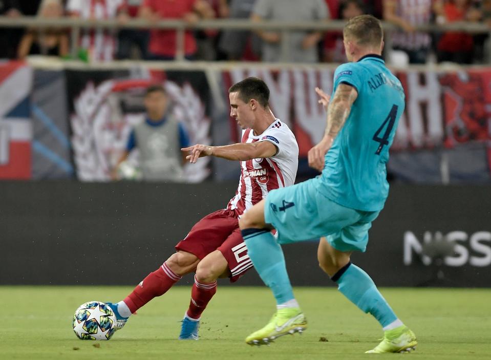 Daniel Podence fires Olympiacos back into the match. (Photo by LOUISA GOULIAMAKI / AFP)        