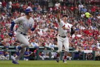 Chicago Cubs' Zach McKinstry, left, grounds out to St. Louis Cardinals starting pitcher Miles Mikolas, right, during the third inning of a baseball game Sunday, Sept. 4, 2022, in St. Louis. (AP Photo/Jeff Roberson)