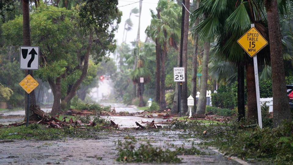 Storm debris litters a street in the wake of Hurricane Ian September 28, 2022, in Sarasota, Florida.