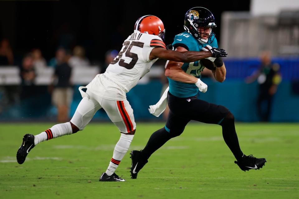 Cleveland Browns safety Jovante Moffatt #35 pressures Jacksonville Jaguars tight end Gerrit Prince #86 during the fourth quarter of a preseason NFL game Friday, Aug. 12, 2022 at TIAA Bank Field in Jacksonville. The Cleveland Browns defeated the Jacksonville Jaguars 24-13. [Corey Perrine/Florida Times-Union]