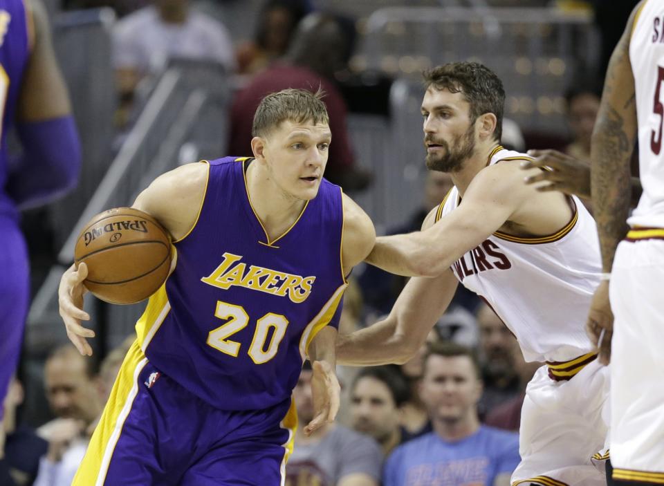 Timofey Mozgov’s four-year, $64 million contract isn’t quite working out for the Lakers. (AP)