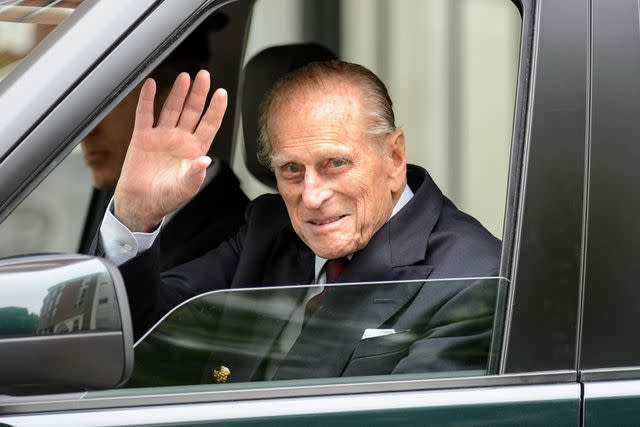 <p>Dominic Lipinski/PA Images via Getty</p> Prince Philip leaves the London Clinic in June 2013.