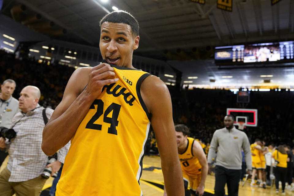 Iowa forward Kris Murray (24) walks off the court after an NCAA college basketball game against Michigan State, Saturday, Feb. 25, 2023, in Iowa City, Iowa. Iowa won 112-106 in overtime. (AP Photo/Charlie Neibergall)