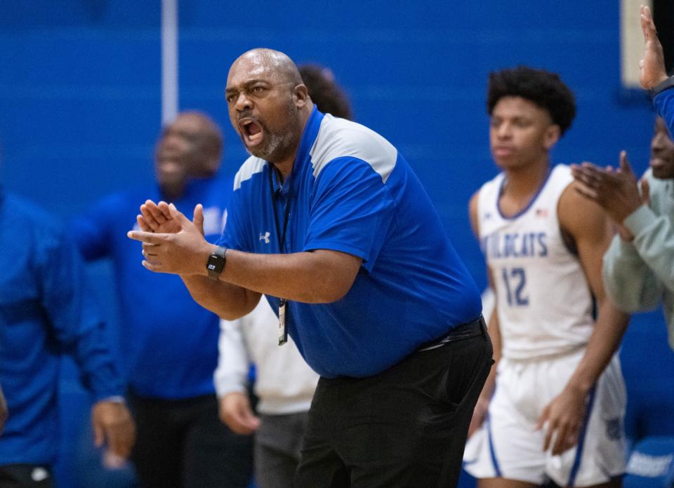 Wildcats head coach Dwayne Louis shouts to his players during the Pine Forest vs Washington boys basketball game at Booker T. Washington High School in Pensacola on Friday, Jan. 19, 2024.