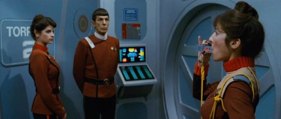Spock and Saavik await Kirk's inspection in Star Trek II: The Wrath of Khan. 