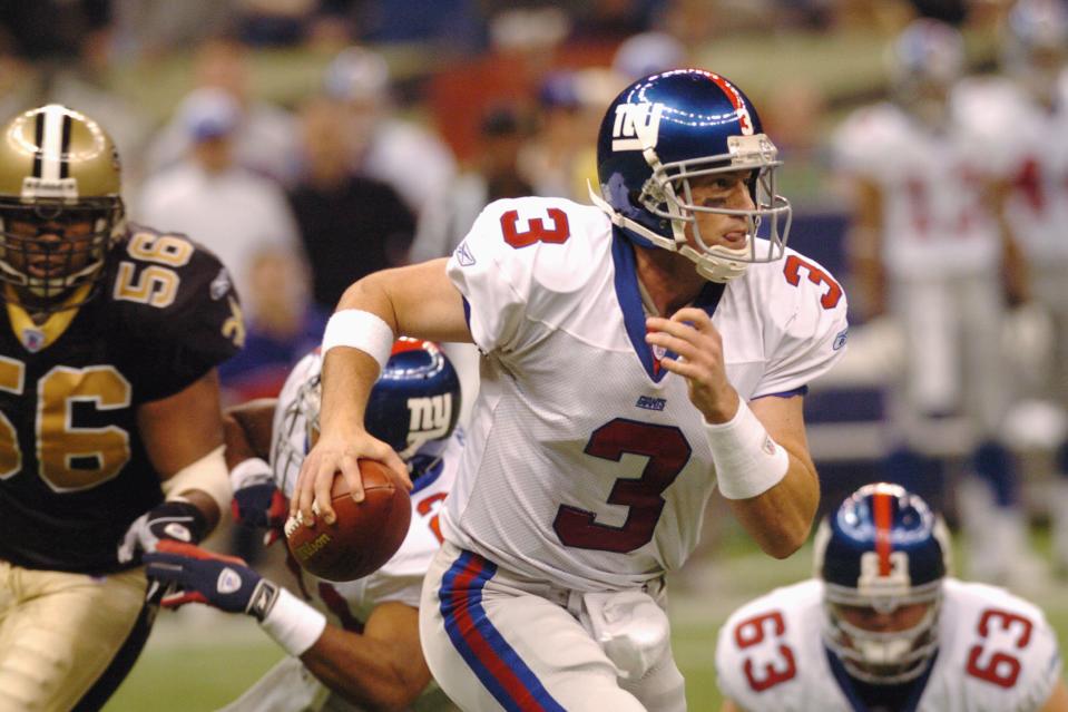 NEW ORLEANS - DECEMBER 14:  Quarterback Jesse Palmer #3 of the New York Giants scrambles with the ball during the game against the New Orleans Saints on Sunday December 14, 2003, at the Superdome in New Orleans, Louisiana.  The Saints won 45-7. (Photo by Chris Graythen/Getty Images)