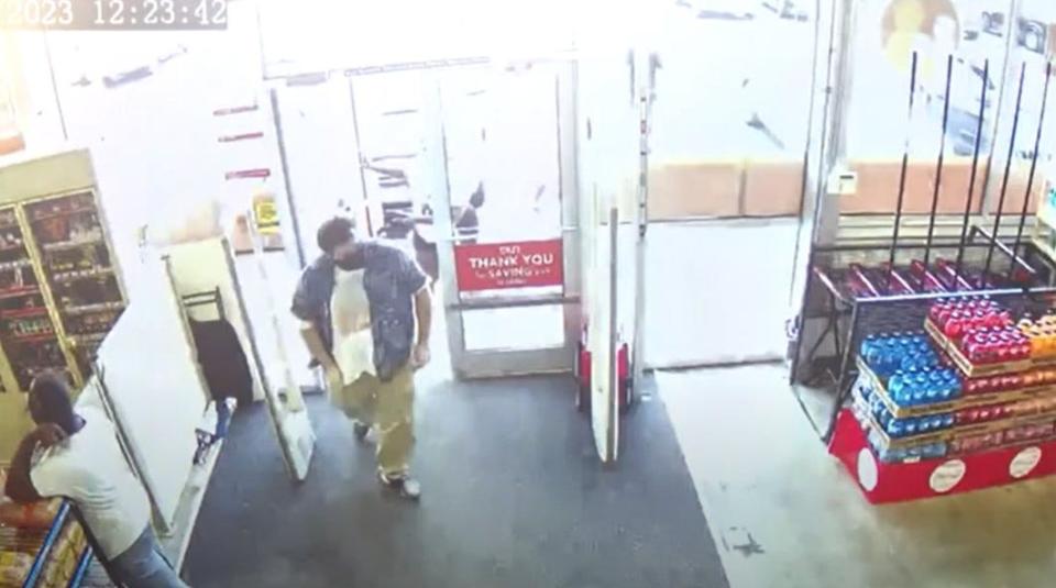 A still from surveillance video at Family Dollar, 1282 Kings Road, shows Ryan Palmeter, 21, entering the store wearing a mask over the lower half of his face. At the store, Palmeter made a purchase before returning to his car and continuing to Edward Waters University and then Dollar General, where he shot and killed three Black people.