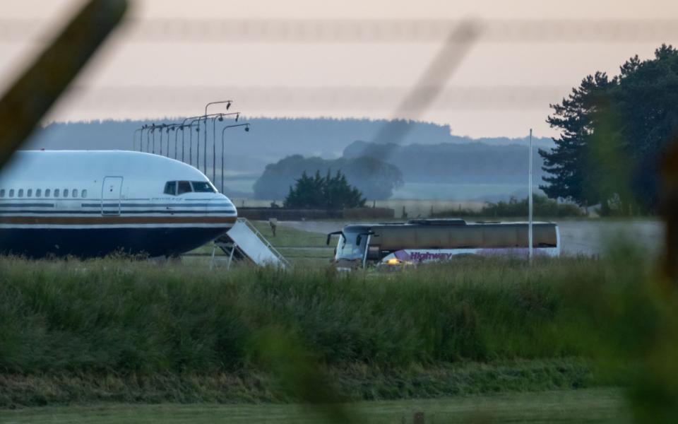 A plane ready to take asylum seekers to Rwanda in June 2022 from Boscombe Down air base in Wiltshire