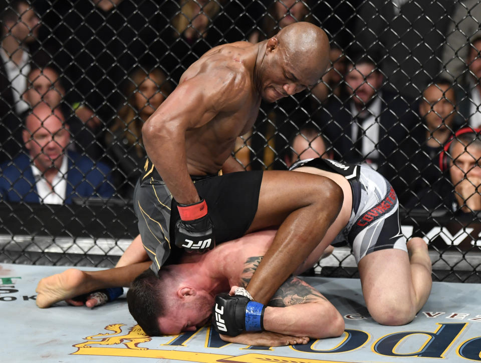 NEW YORK, NEW YORK - NOVEMBER 06: (L-R) Kamaru Usman of Nigeria punches Colby Covington in their UFC welterweight championship fight during the UFC 268 event at Madison Square Garden on November 06, 2021 in New York City. (Photo by Jeff Bottari/Zuffa LLC)