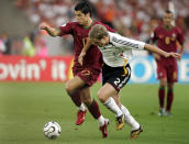 FILE - Germany's defender Marcell Jansen, right, challenges Portugal's Cristiano Ronaldo during the World Cup 3rd place soccer match between Germany and Portugal at the Gottlieb-Daimler stadium in Stuttgart, Germany, Saturday, July 8, 2006. (AP Photo/Mark J. Terrill, File)