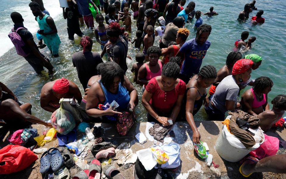 US dispatches 1000 border force officers as it scrambles to contain Haitian migrant crisis on Rio Grande - Eric Gay /AP