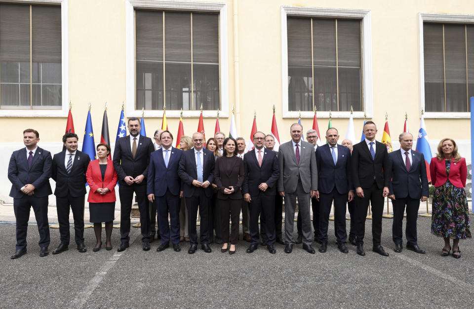 Foreign Ministers and other officials pose for a family photo during a summit in Tirana, Albania, Friday, Oct. 6, 2023. Foreign Ministers of the Western Balkans and the European Union member countries in the Berlin process, trying to raise up regional cooperation in their march toward becoming block members in the future, convene in Tirana to prepare the summit which is held in a non-EU member country. (AP Photo/Franc Zhurda)