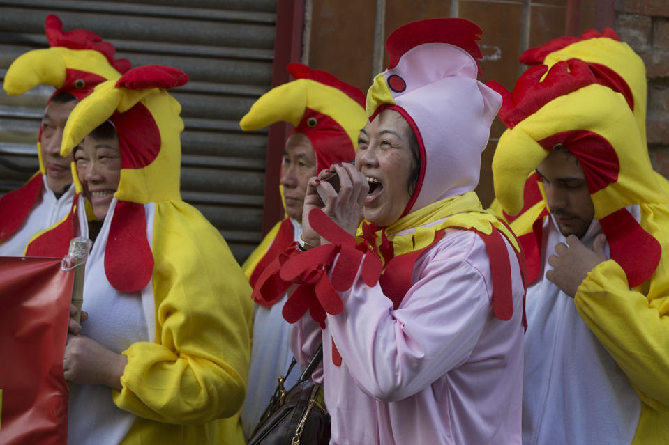 People from the Chinese community celebrate the Lunar New Year, the year of the Rooster, in Madrid, Spain Saturday Jan. 28, 2017. (AP Photo/Paul White)