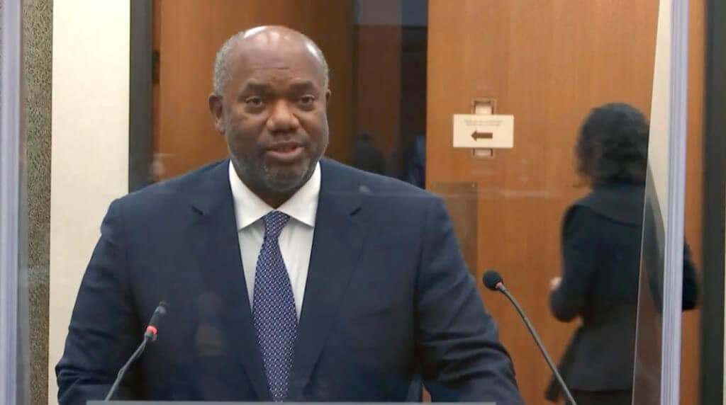 In this image from video, prosecutor Jerry Blackwell questions Dr. Lindsey Thomas, a forensic pathologist, now retired, as Hennepin County Judge Peter Cahill presides Friday, April 9, 2021, in the trial of former Minneapolis police Officer Derek Chauvin at the Hennepin County Courthouse in Minneapolis. Chauvin is charged in the May 25, 2020 death of George Floyd. (Court TV via AP, Pool)