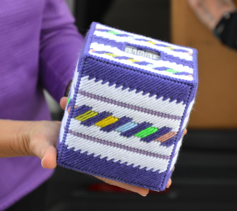 Linda Gotham, a member of the Heritage Isle Crafters, makes tissue box covers to distribute to veterans who might be going home from the hospital, into assisted living, or into other living arrangements.