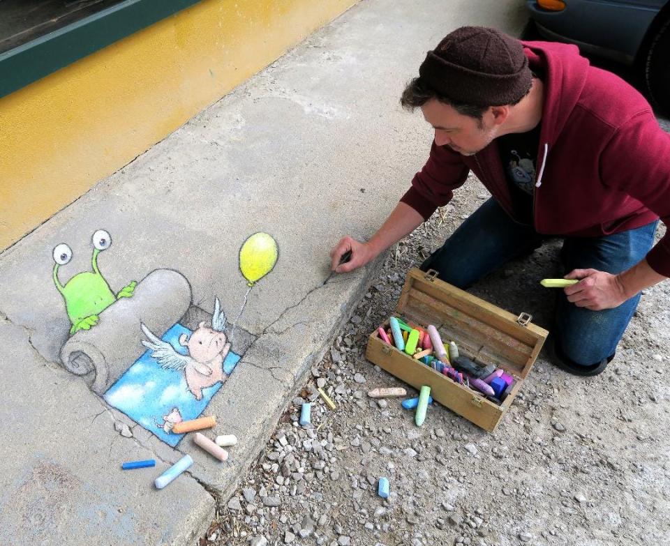 David Zinn and his chalk art illustrations in cracks in the sidewalk, bricks on buildings or manholes will be on display at the Funky Ferndale Art Fair.