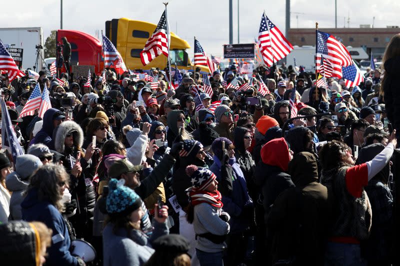 Truckers and their supporters form a convoy bound for the nation's capital from California